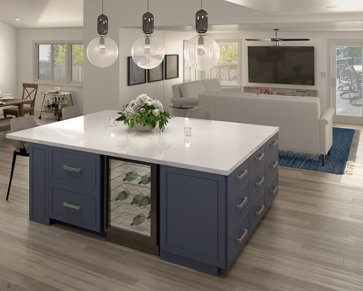 The image displays a modern kitchen with a large island featuring a sink and faucet, topped with a white countertop. The island has open cabinets below and is flanked by closed cabinets. Above the island hang three pendant lights, and there s a wine rack integrated into the design. The surrounding area includes a light wood floor, a rug in front of a sofa, and a wall-mounted TV. The kitchen is illuminated with natural light coming from a large window.