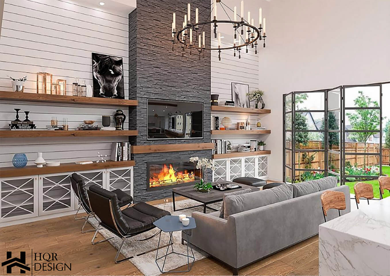 A modern living room interior with a fireplace, white walls, a chandelier, and contemporary furniture.