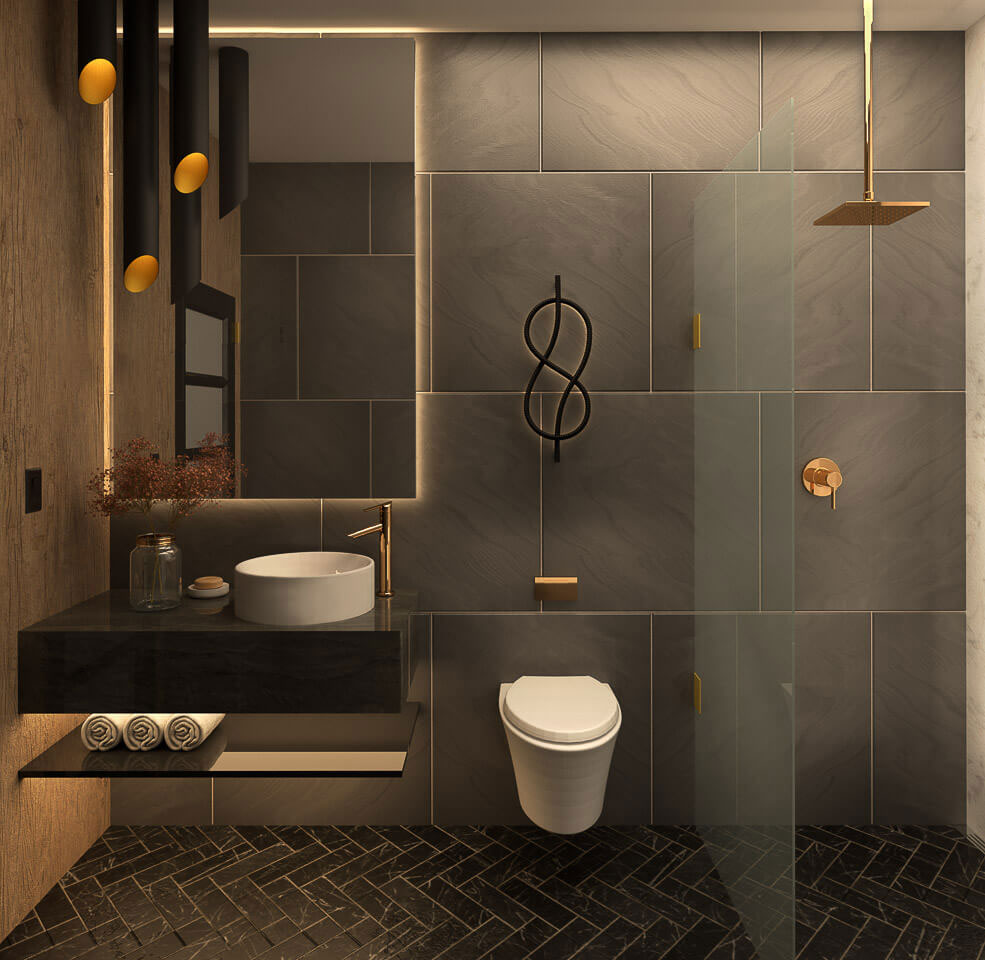 This is an interior view of a modern bathroom featuring a monochromatic color scheme with gray tiles on the walls, dark flooring, a white toilet, a black sink, and a shower area with a glass enclosure.